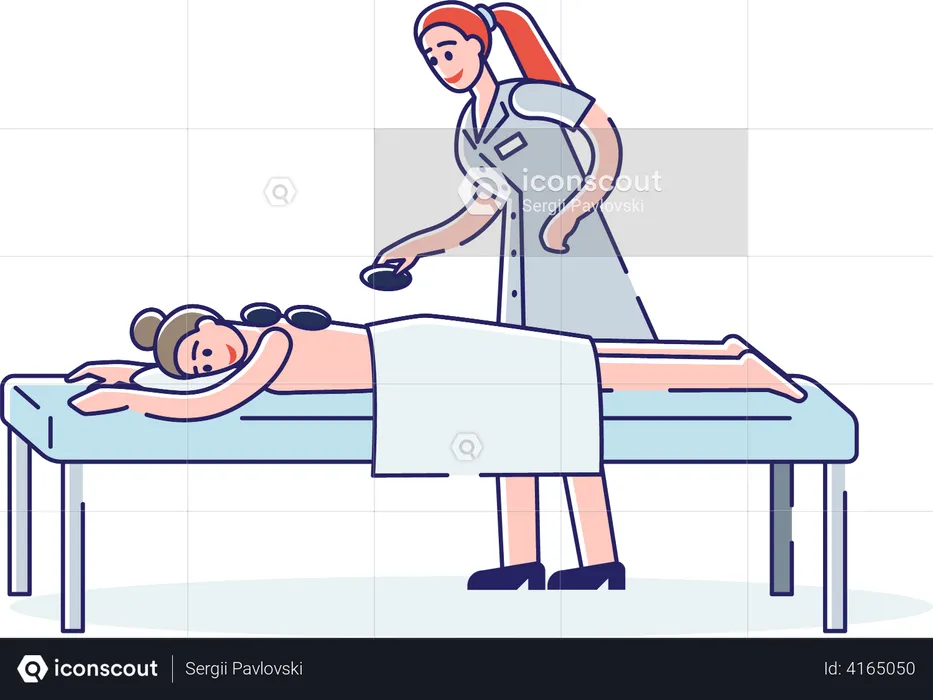 Femme ayant un massage aux pierres chaudes  Illustration