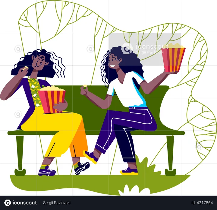 Girls sitting in park bench eating popcorn  Illustration