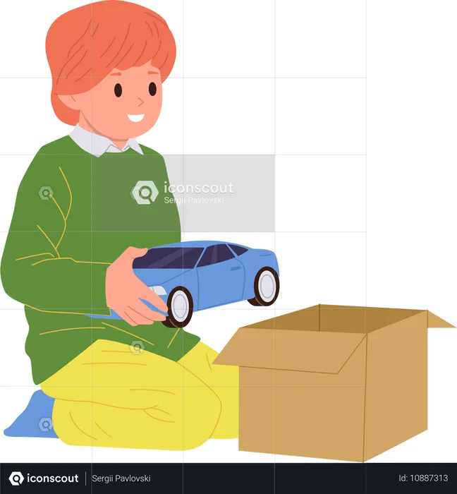 Menino bonitinho embalando um carrinho de brinquedo em uma caixa de papelão antes da mudança  Ilustração