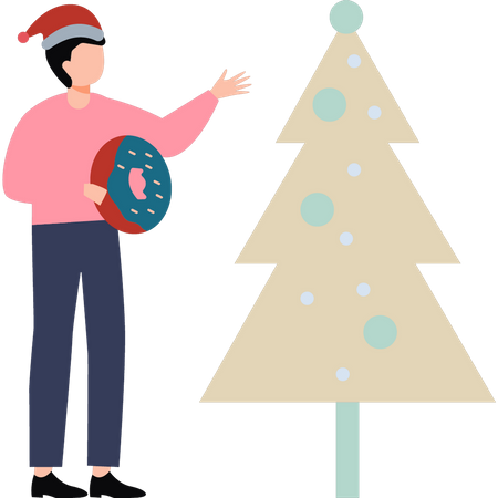 A boy with a donut stands by a Christmas tree  Illustration
