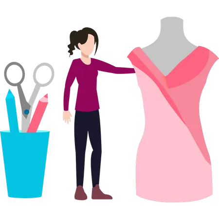 A Girl Is Designing A Dress On A Mannequin イラスト