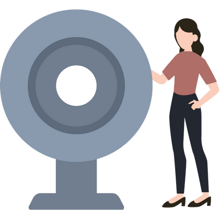 A girl is standing next to a webcam  Illustration