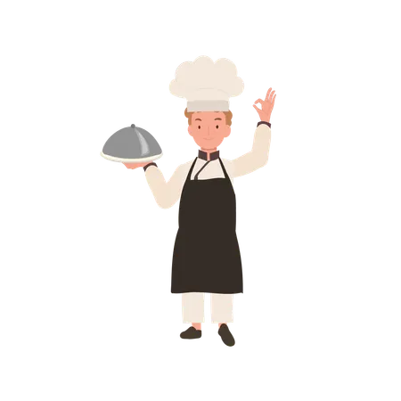 Adorável chef infantil com chapéu de chef fazendo sinal de mão ok  Ilustração