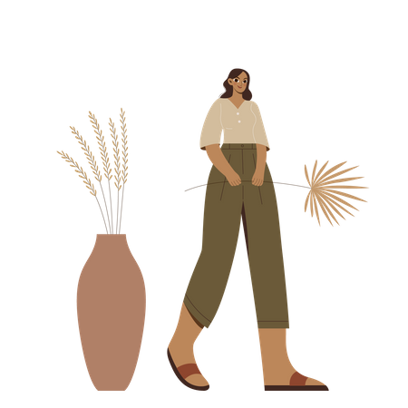 Boho Girl marchant et tenant une plante  Illustration