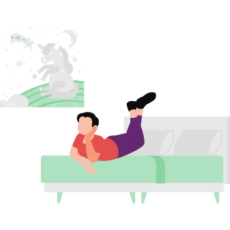Boy is daydreaming while lying on bed  Illustration