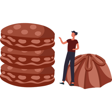 Boy is looking at the chocolate biscuit  イラスト