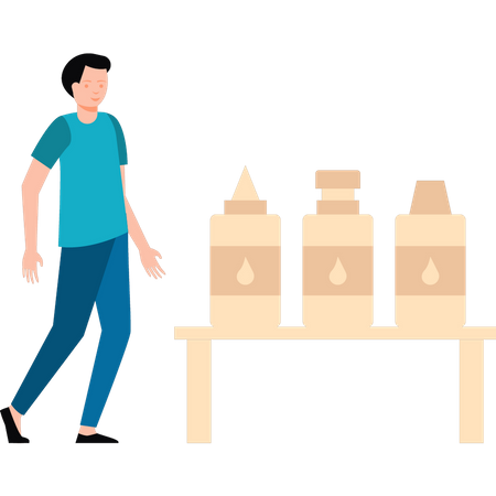 Boy looking at paint bottles  Illustration