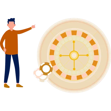 Boy pointing to roulette wheel  Illustration