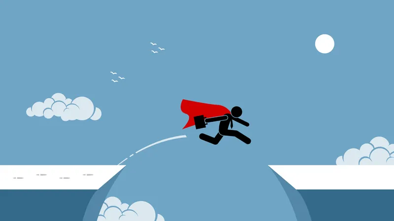 Businessman with red cape taking risk by jumping over a chasm  Illustration