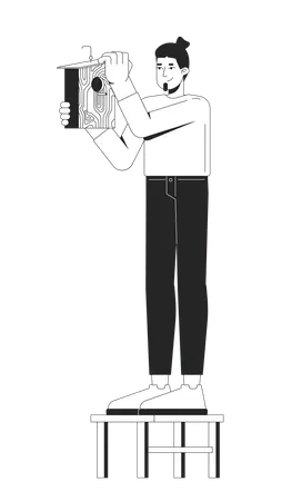 Caucasian man installing wooden birdhouse  Illustration