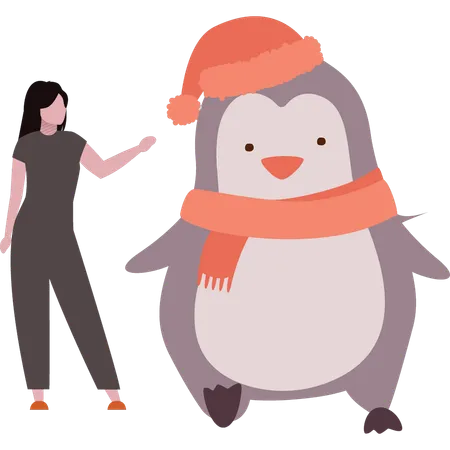 La chica se divierte con el pingüino.  Ilustración