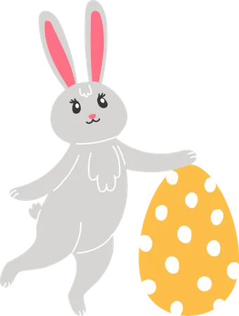 Conejito de Pascua con huevo pintado  Ilustración