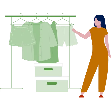 Dress designer standing with her articles  Illustration