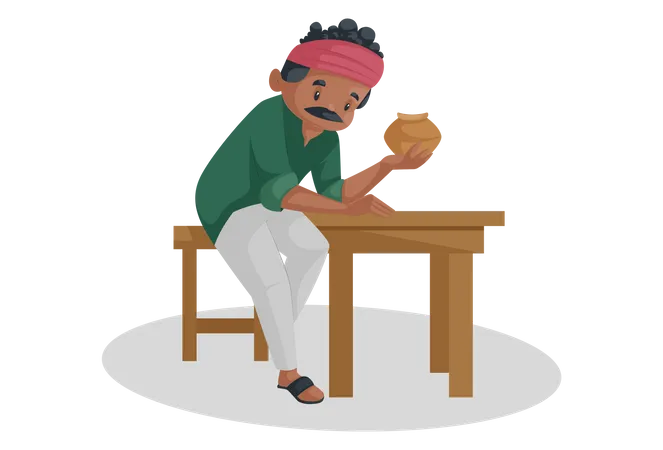 El alfarero indio está sentado en una mesa y sosteniendo una vasija de barro en la mano  Ilustración
