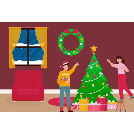 Familia feliz decorando el árbol de Navidad  Ilustración