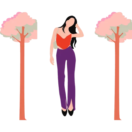 Fille de mode debout au milieu des arbres  Illustration