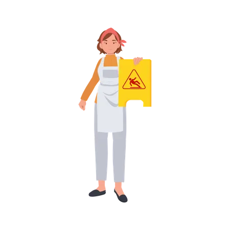 Female housekeeper showing caution wet floor sign Illustration