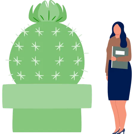 Femme de bureau debout près d'une plante de cactus  Illustration