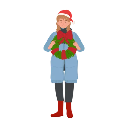 Femme heureuse avec couronne de Noël  Illustration