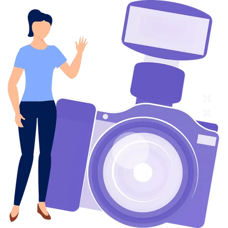 Femme montrant un appareil photo numérique  Illustration