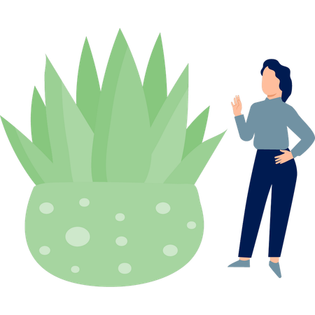 Femme montrant une plante d'Alovera  Illustration