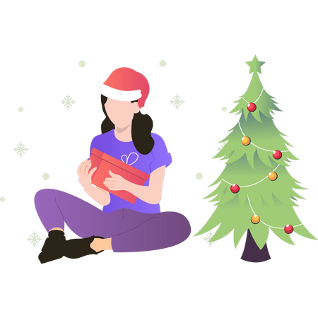 Fille assise près du sapin de Noël et tenant une boîte-cadeau  Illustration