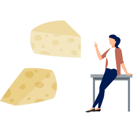 Fille assise sur une table et pointant du fromage  Illustration