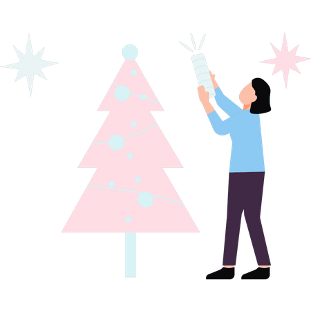 Fille célébrant Noël avec des feux d'artifice  Illustration