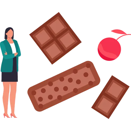 La fille mange des chocolats aux cerises  Illustration