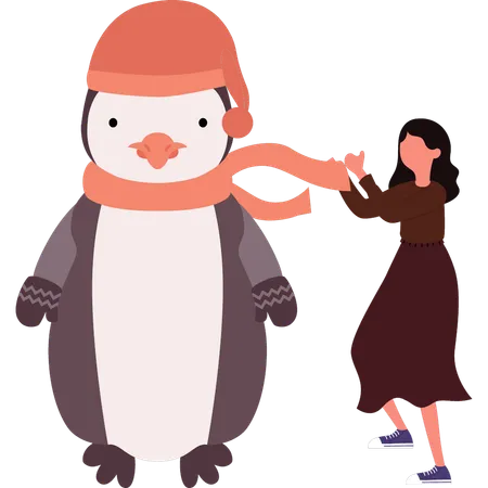 La fille met un foulard autour du cou des pingouins  Illustration