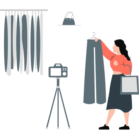 Fille réalisant des vidéos promotionnelles pour des vêtements  Illustration