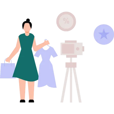 Fille réalisant des vidéos promotionnelles pour des vêtements  Illustration