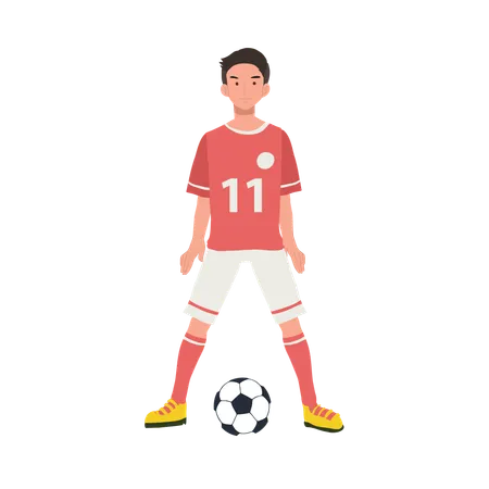 Jugador de fútbol de pie con el balón de fútbol  Ilustración