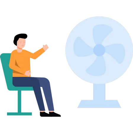 Garçon assis devant un ventilateur de refroidissement  Illustration