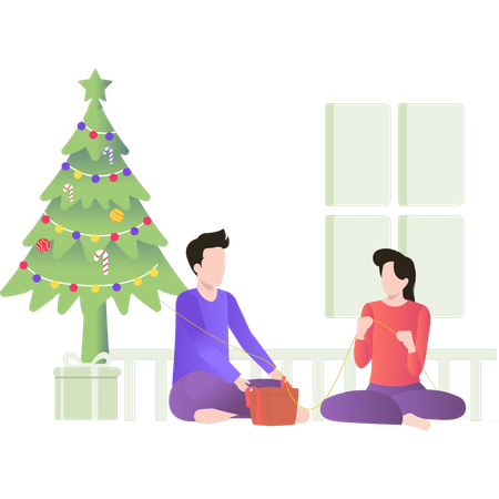 Garçon et fille emballant des cadeaux de Noël  Illustration