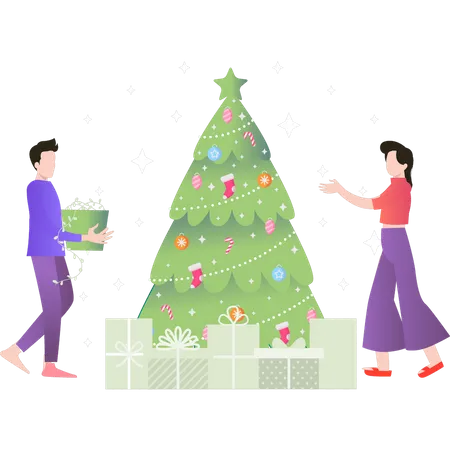 Garçon et fille regardant l'arbre de Noël  Illustration