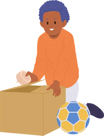 Un garçon heureux emballant un ballon de football dans une boîte en carton préparant un cadeau  Illustration