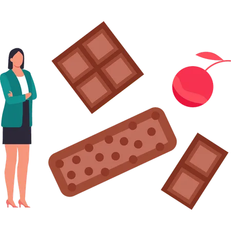 A menina está comendo chocolates com cerejas  Ilustração