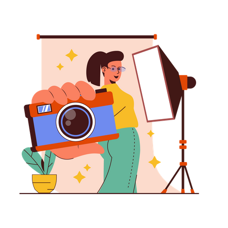 Girl holding camera in photo studio  Illustration