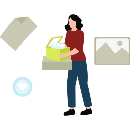 Girl is holding a box of pictures  Illustration
