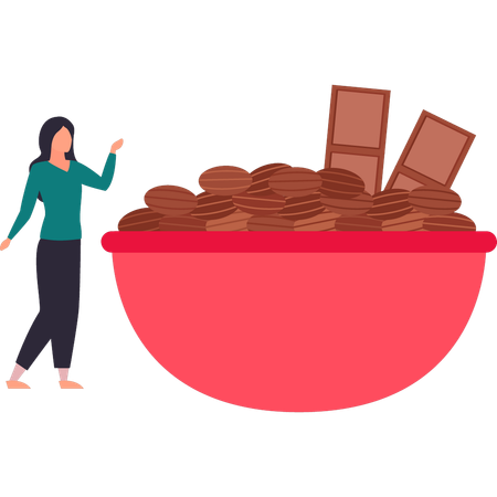Girl is looking at a bowl of choco beans  イラスト