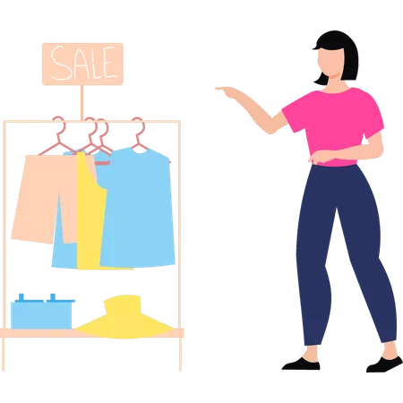 Girl is pointing to clothes on rack for sale  Illustration