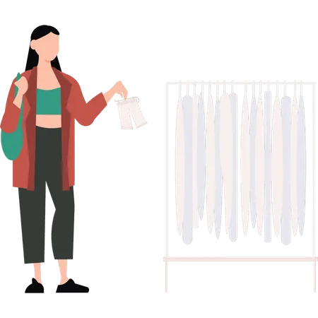 Girl is standing by the clothes rack  Illustration