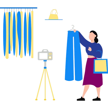 Girl making promotional videos for clothes  Illustration