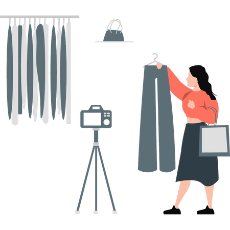 Girl making promotional videos for clothes  Illustration