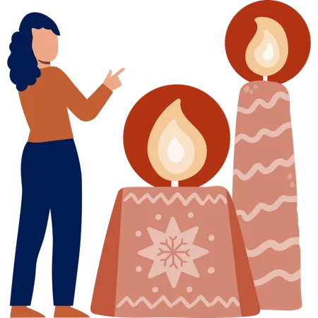 Girl pointing at diwali candle  Illustration