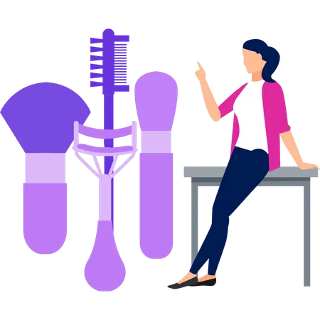 Girl pointing to different beauty brushes  Illustration