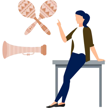 Girl pointing to music maracas  Illustration