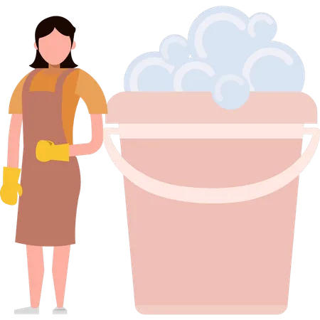 The Girl Is Standing Next To A Bucket Illustration
