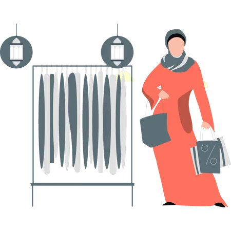 Mujer hijab haciendo compras en venta  Ilustración